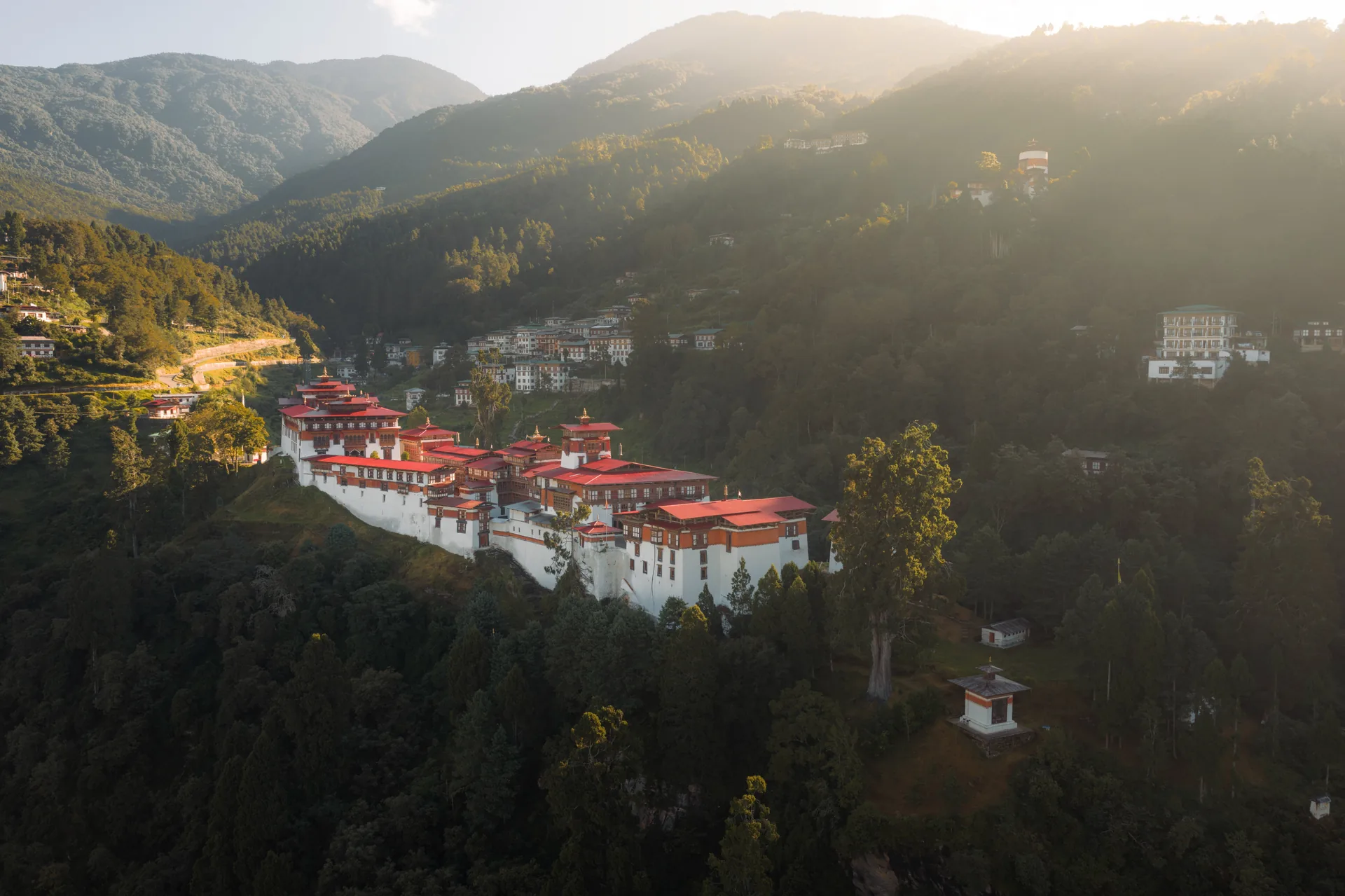 Trongsa Dzong fortress bathed in golden hour light, Bhutan
