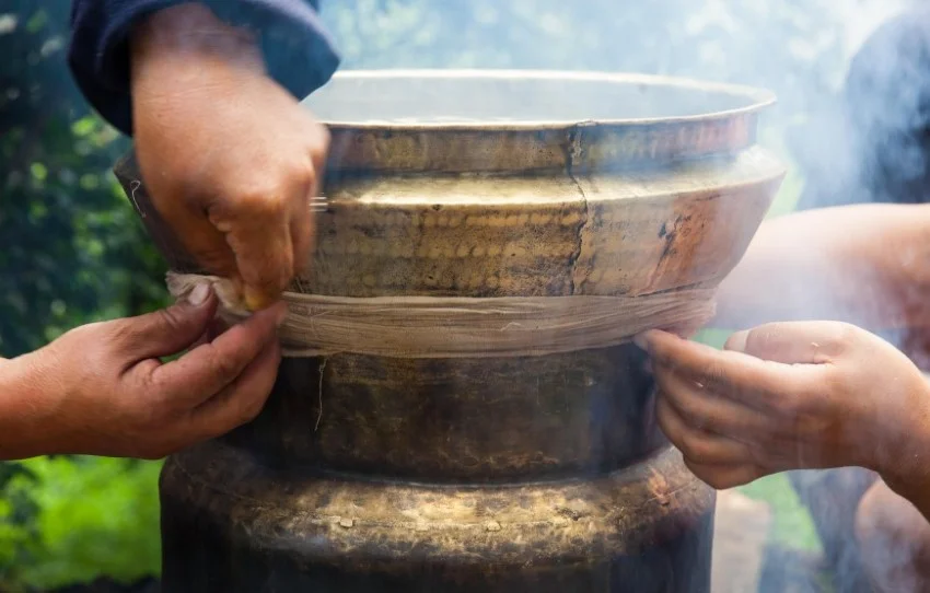 A Toast to Bhutan: Traditional Alcohol, Local Drinks & the Stories Behind Them - Ara making Thimpu Bhutan5 large