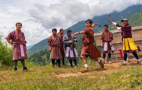 Archery in Bhutan: The National Sport Explained - men playing khuru in bhutan large