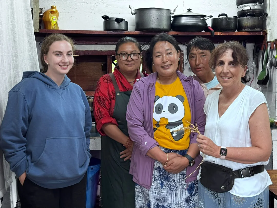 Booking Bhutan Yourself vs. Using a Bhutan Tour Operator: What's the Difference? - mother daughter cooking class bhutanese food large
